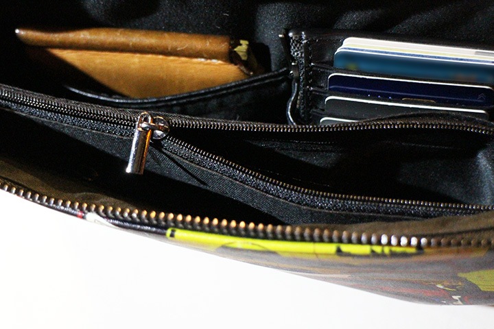 OSSANTHEHOOD clutch bag / multi