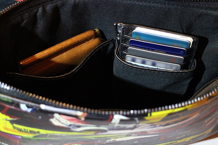 OSSANTHEHOOD clutch bag / multi