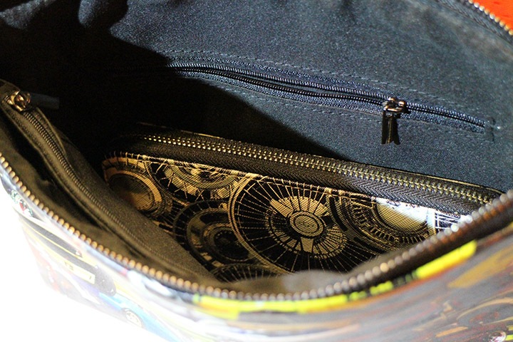 OSSANTHEHOOD clutch bag / multi