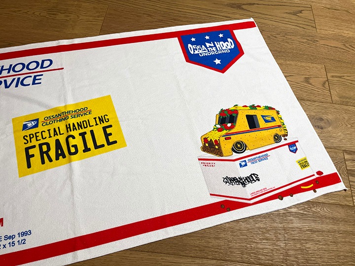 OSSANTHEHOOD beach towel (postal) / white