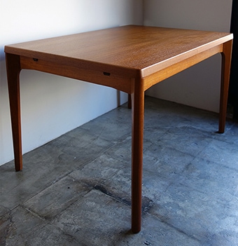 Dining table by Henning Kjaernulf