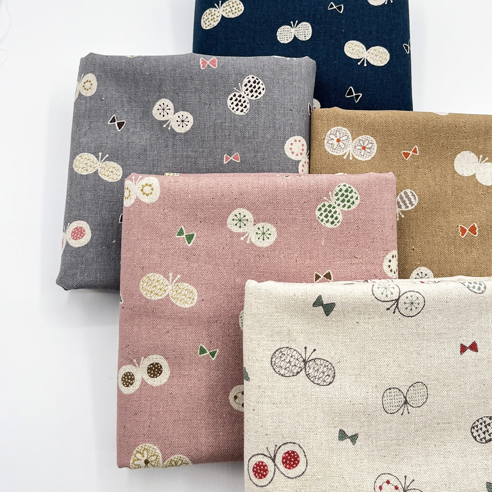 【sale】コットンリネンキャンバス｜ちょうちょとリボン プリント｜綿麻 ちょうちょ（ナチュラル)