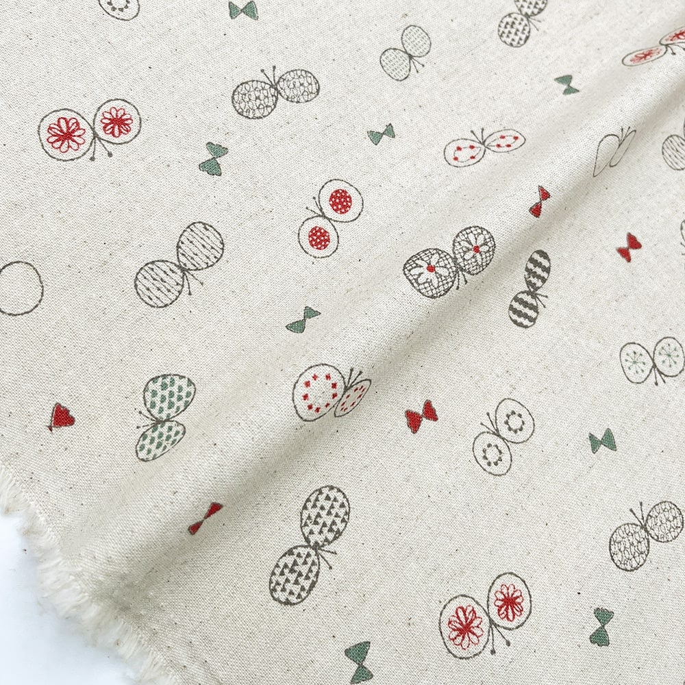 【sale】コットンリネンキャンバス｜ちょうちょとリボン プリント｜綿麻 ちょうちょ（ナチュラル)
