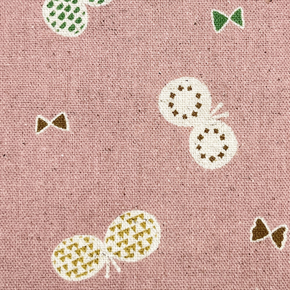 【sale】コットンリネンキャンバス｜ちょうちょとリボン プリント｜綿麻 ちょうちょ（ピンクアーモンド)