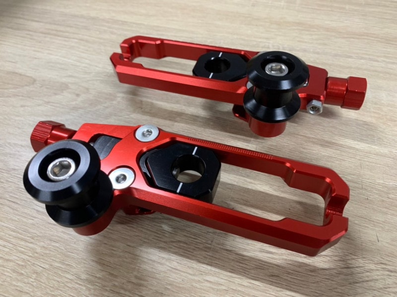 XSR155/125 CNC 󥢥㥹2å  GPTECH-CHAINADJ-RED-G5@