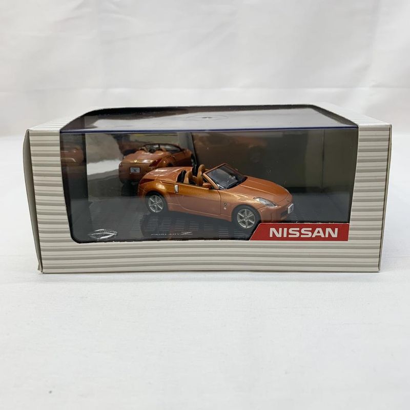 中古】S)1/43 ﾃﾞｨｰﾗｰ特注 日産ﾌｪｱﾚﾃﾞｨZﾛｰﾄﾞｽﾀｰ(ｵﾚﾝｼﾞ)【O大府