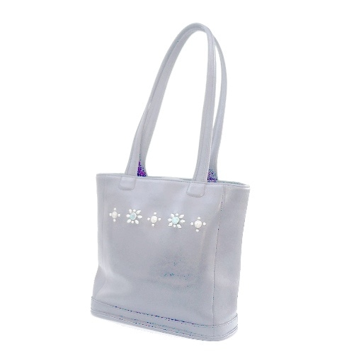 オールドコーチにヴィンテージ加工を施したスタッズや天然ターコイズで