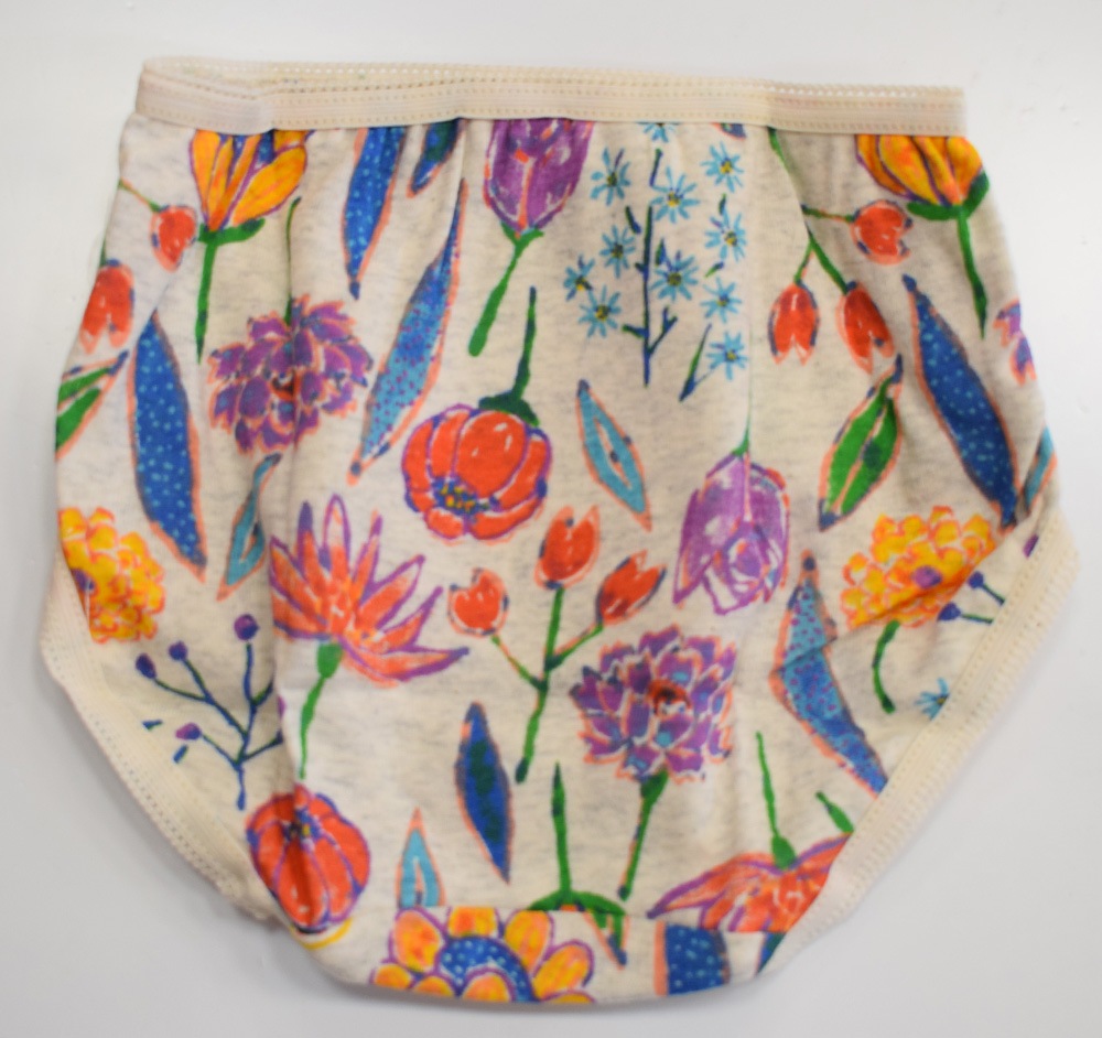 オーシャンアンドグラウンド ガールズショーツ PAINTING FLOWERS オレンジ