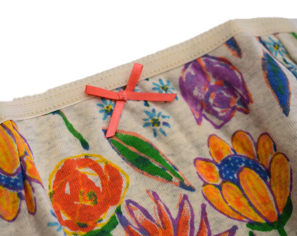 オーシャンアンドグラウンド ガールズショーツ PAINTING FLOWERS オレンジ