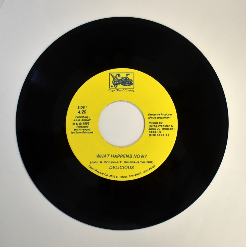 Delicious - What Happens Now? / ( Were Getting Into ) Trouble    [7inch]