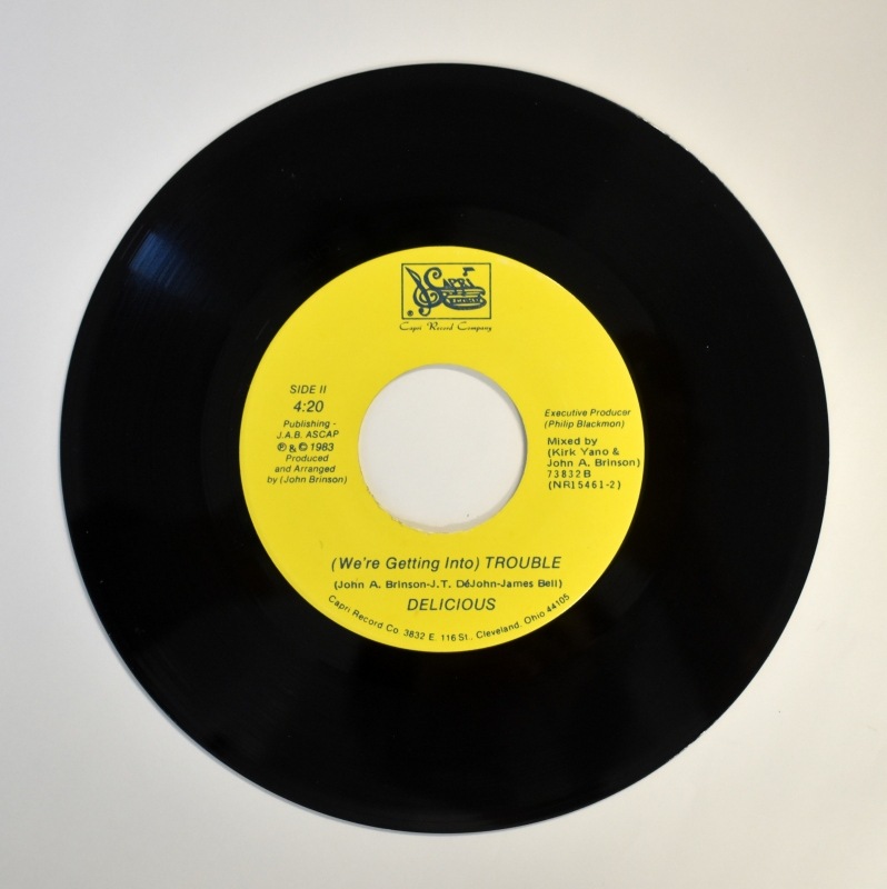 Delicious - What Happens Now? / ( Were Getting Into ) Trouble    [7inch]