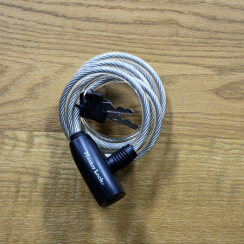SELF COILING KEYED CABLE LOCK