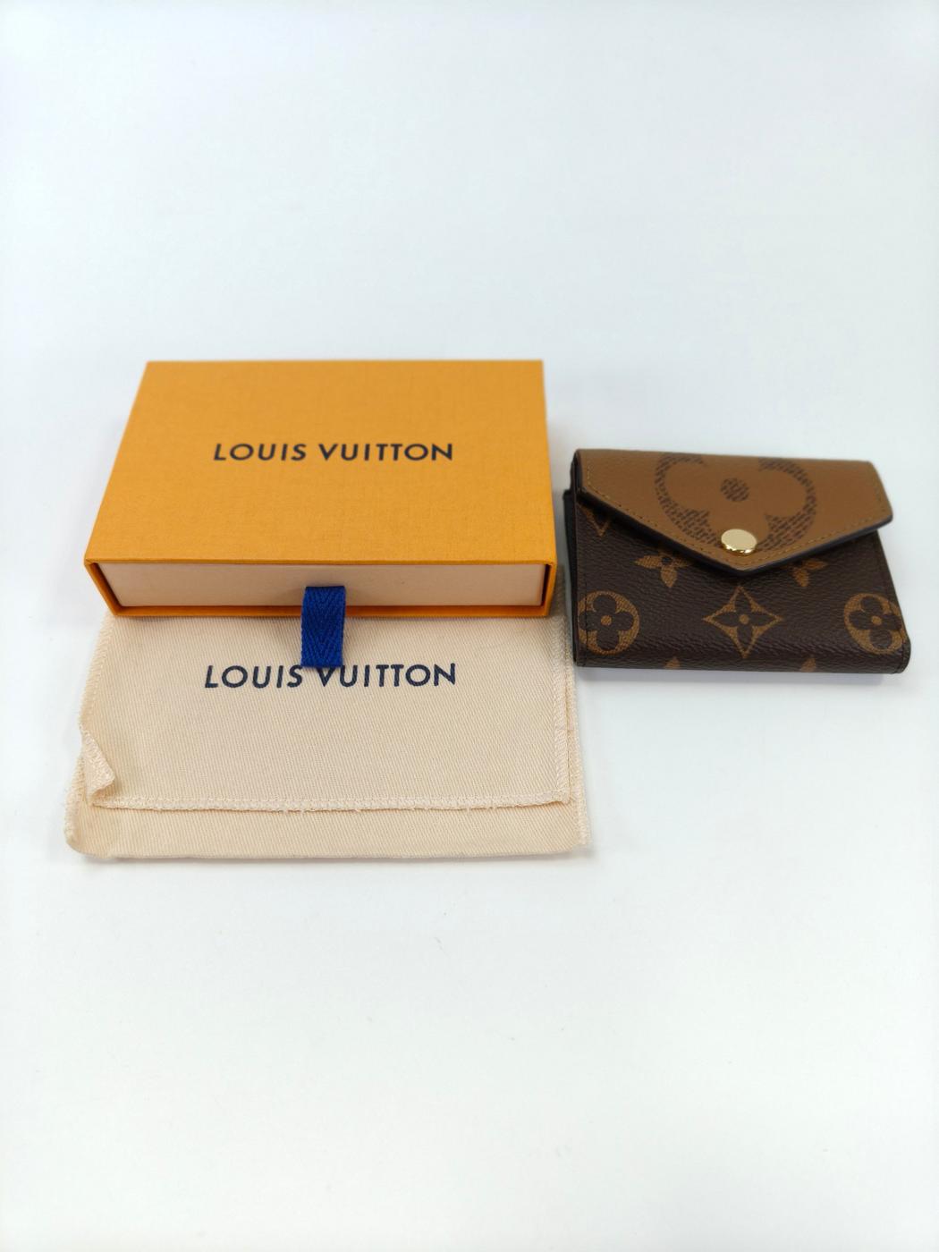 LOUIS VUITTON �륤�����ȥ� �ݥ�ȥե����桦���� �����ޤ� ���� ��Υ���� �֥饦�� �����ֹ桧10575