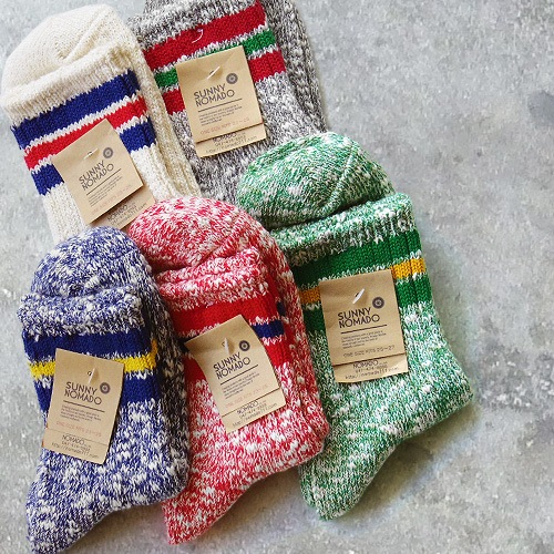 ɥ إ å SUNNY NOMADO