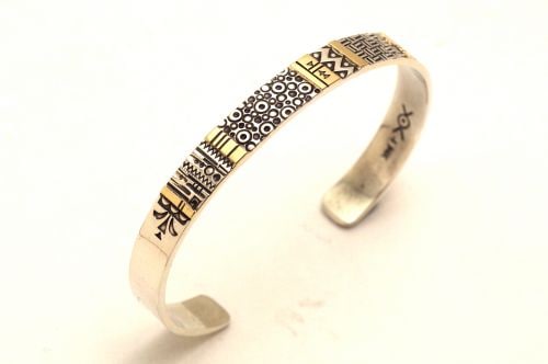 ナバホバングル ノルバート・ペシュラカイ作 《スタンプワーク&14K》 内周16cm