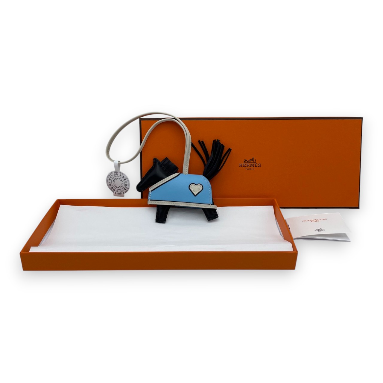 エルメス ロデオチャーム ロベオクール PM ノワール/クレ/セレステ K