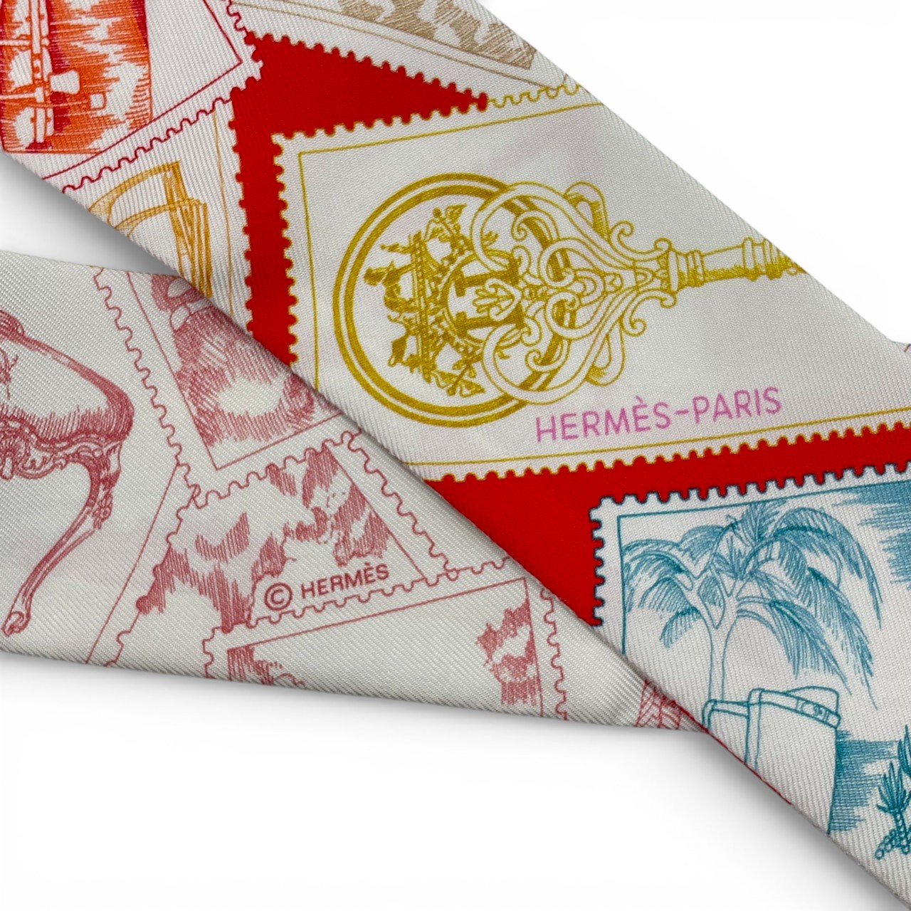 エルメス ツイリー フォーブルの切手愛好家 ピンク / レッド / マルチ