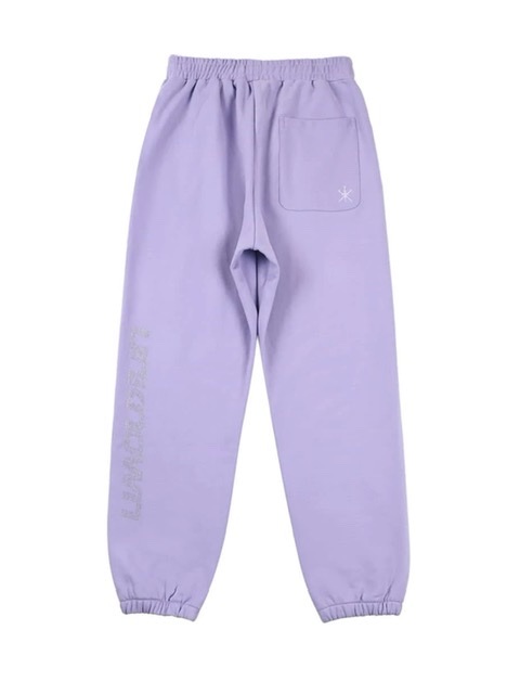 UNKNOWN アンノウン　BLUE RHINESTONE JOGGER UNKNOWN LONDON（アンノウン・ロンドン）の「A'GEM/9 × .kom