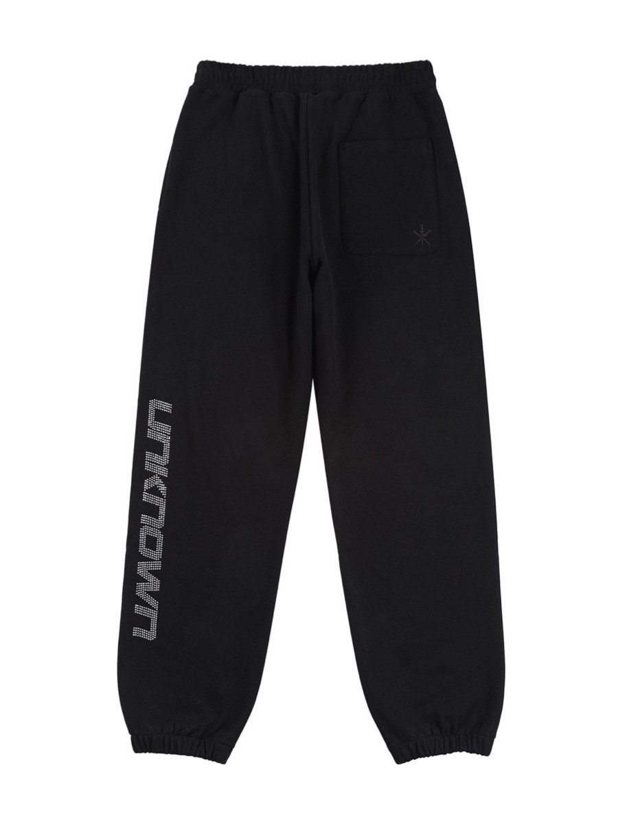 UNKNOWN アンノウン ☆ Signature Rhinestone Joggers ロゴ unknown】AW22 UNKNOWN SIGNATURE RHINESTONE LOGO JOGGERS 01
