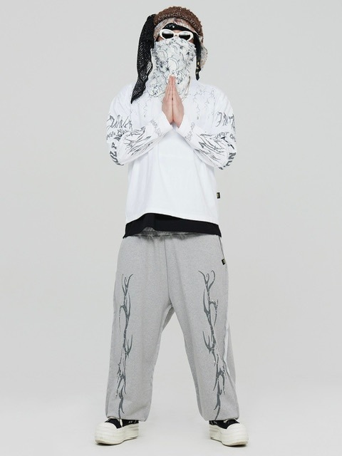 1/28再入荷【HOLY NUMBER 7】HOLYNUMBER7 X MBA Vintage graphic Stud Training Pants