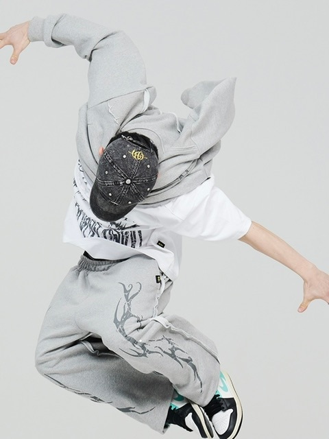 1/28再入荷【HOLY NUMBER 7】HOLYNUMBER7 X MBA Vintage graphic Stud Training Pants