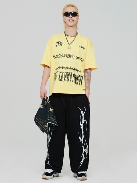 1/28再入荷【HOLY NUMBER 7】HOLYNUMBER7 X MBA Vintage graphic Stud Training Pants