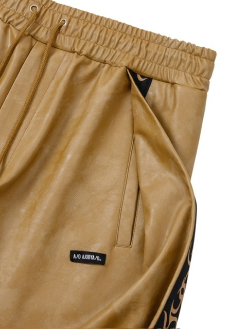 AJOBYAJO】Vegan Leather One Tuck Track Pants | OUR BRAND