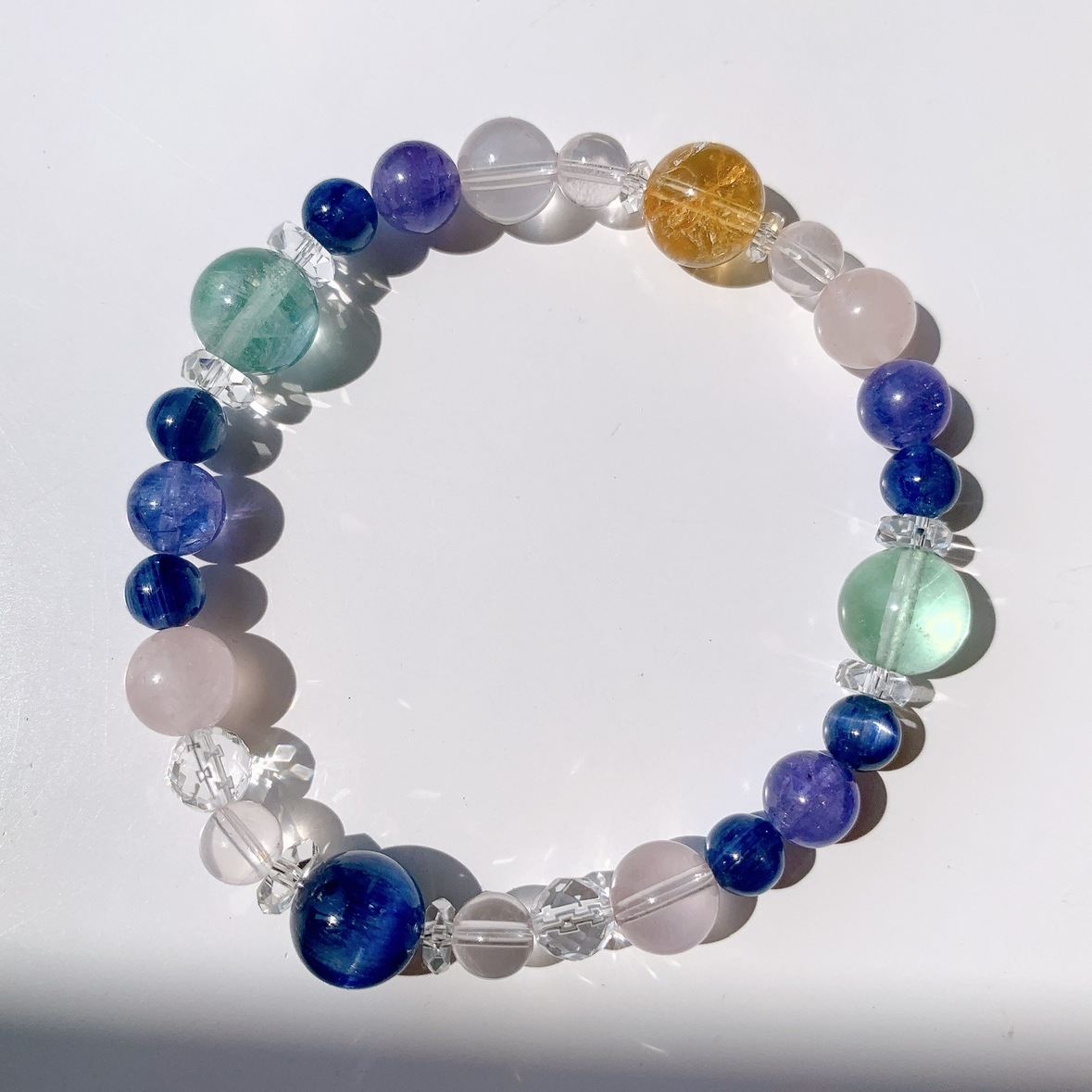 [104Y]カイヤナイト,ローズクォーツ,スターローズクォーツ,タンザナイト,フローライト,シトリン,水晶 ブレスレット