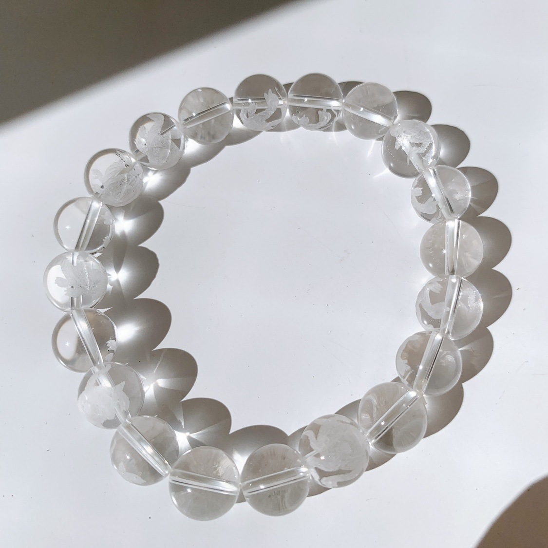 水晶玄武彫り物入り ブレスレット | ブレスレット | Crystals by Purely