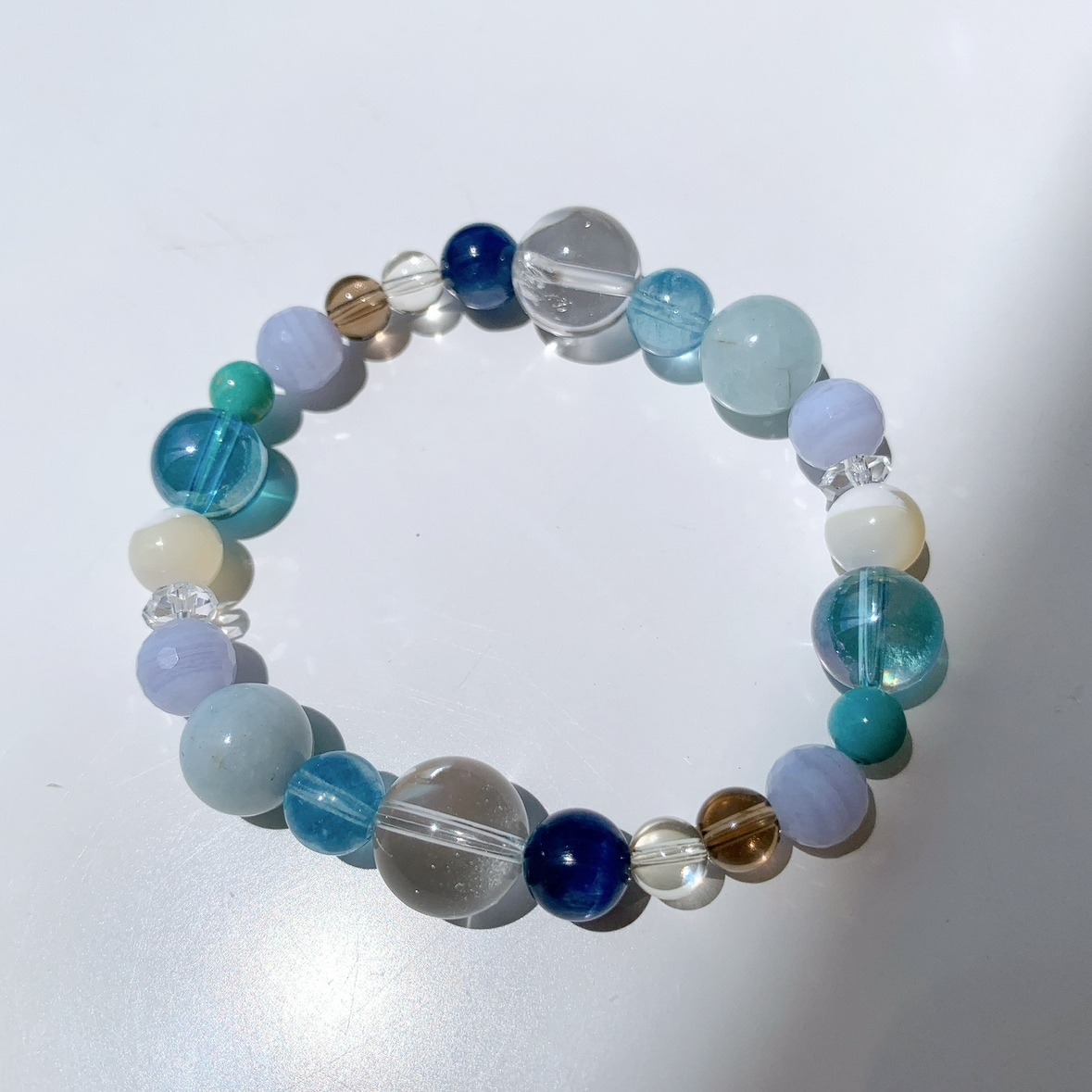 [114Y]水晶,アクアマリン,ブルーレースアゲート,マザーオブパール,アクアオーラ,ターコイズ,スモーキークォーツ,レモンクォーツ,カイヤナイト ブレスレット