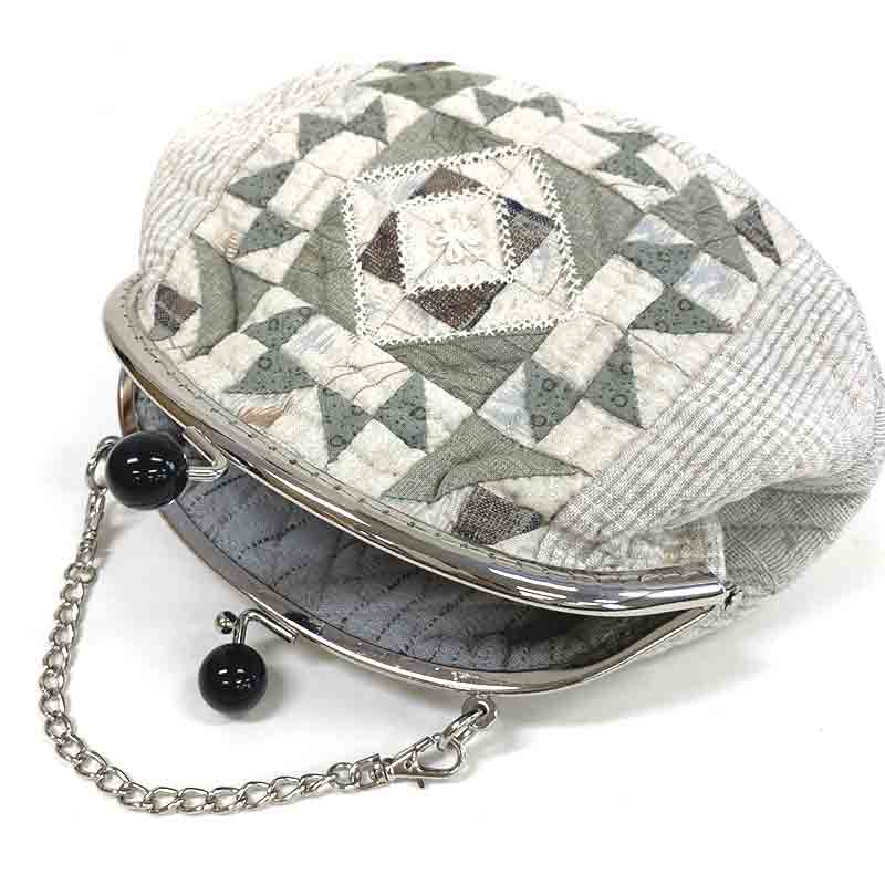 フラワースターの玉付口金ポーチ