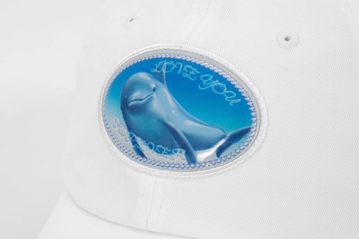 ivory dolphin ball cap 