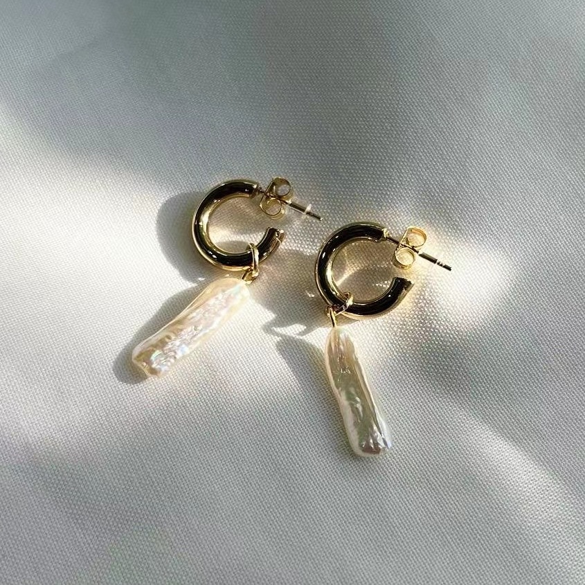 Pearl charm pierce
