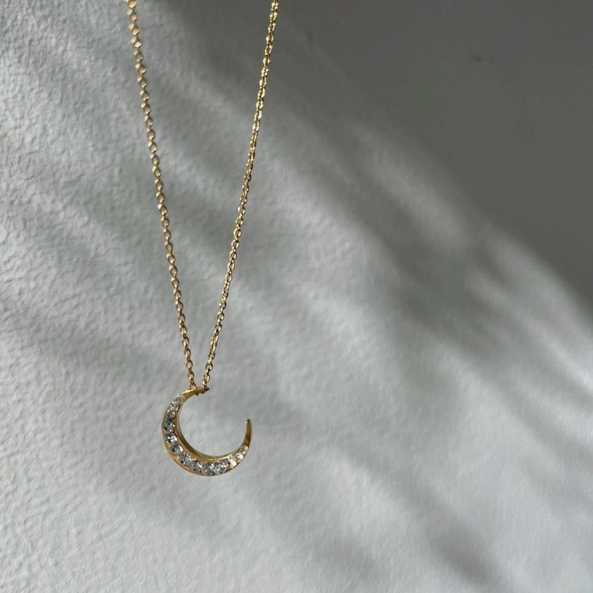 sw moon motif necklace
