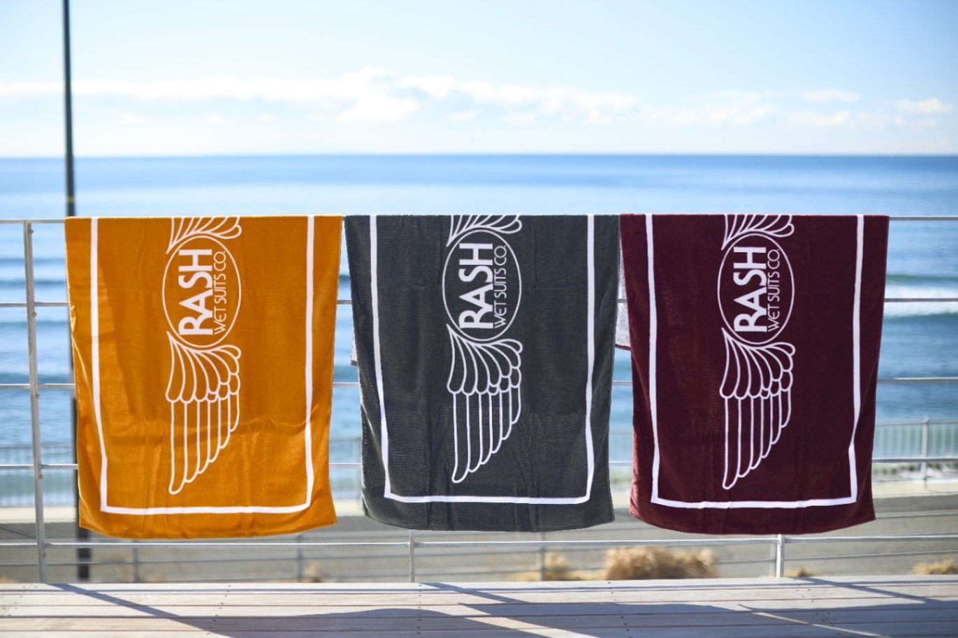 RASH WETSUITS ビーチタオル RASH ラッシュビーチタオル 羽マーク/ラッシュウェットスーツ