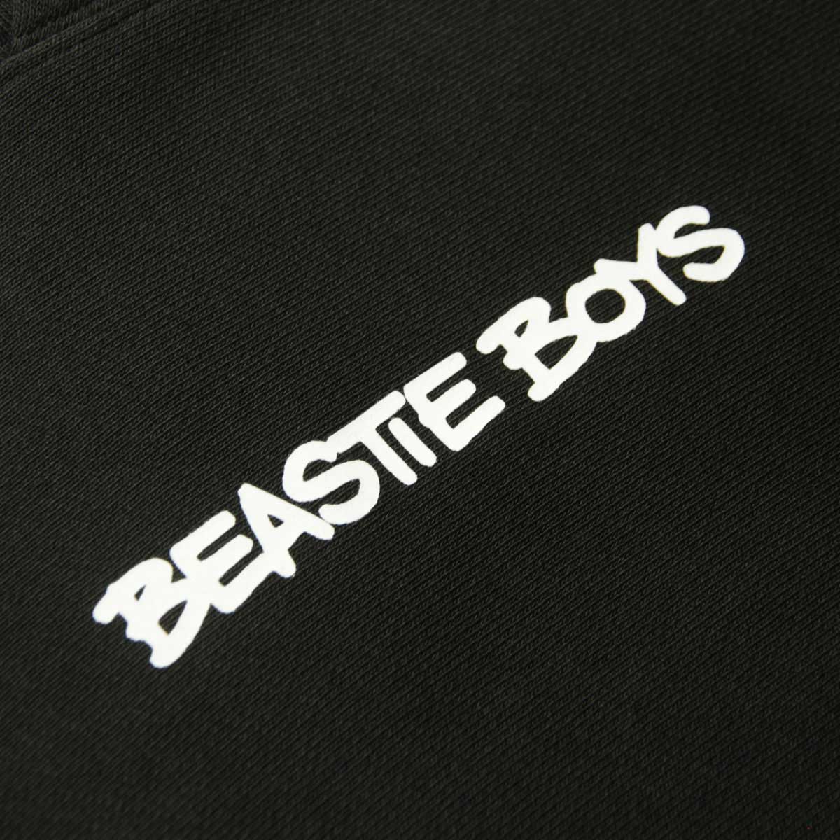 �����ԥ��� ��� �ѡ����� ������ CHAMPION �ӡ����ƥ����ܡ����� �ץ륪���С� �ա��ǥ��� CHAMPION X BEASTIE BOYS TCV REVERSE WEAVE SOFT FLEECE "CHECK YOUR HEAD" HOODED SWEATSHIRT 219279 KK001 NBK BLACK
