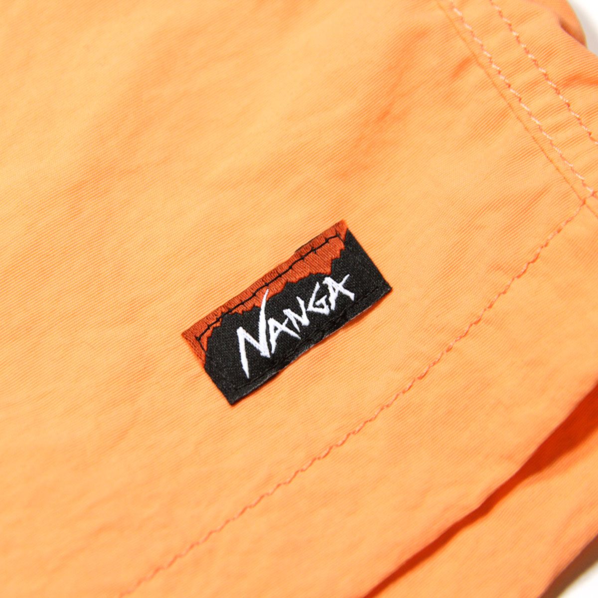 �ʥ� ��� ���硼�ȥѥ�� ��������Ź NANGA �ʥ����� �ϡ��եѥ�� û�ѥ� NYLON TUSSER EASY SHORTS NW2321-1I512 S.ORANGE A16B B1C C2D D4E E10F