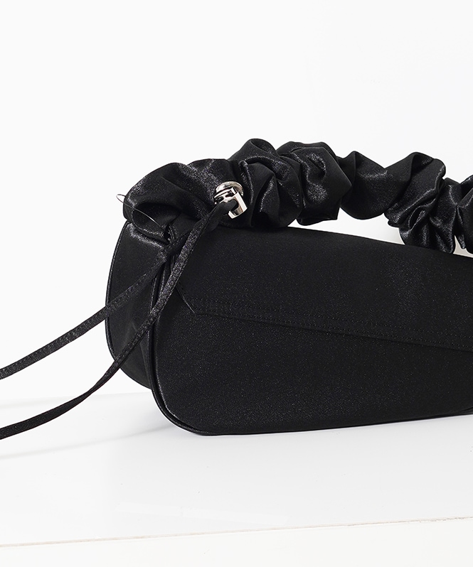 Frill handle clutch