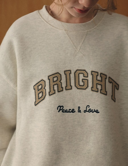 ピースのレタリング羊毛スウェット