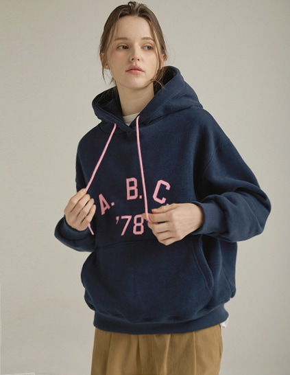 プニッツ 羊毛混紡 フードトップス