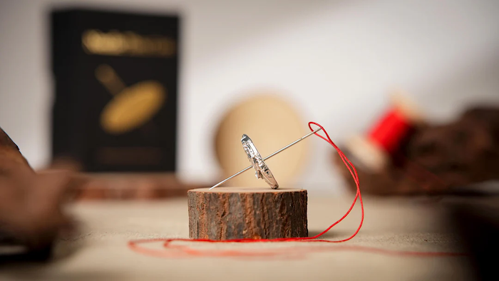 Needle Thru Coin by Artisan Coin 