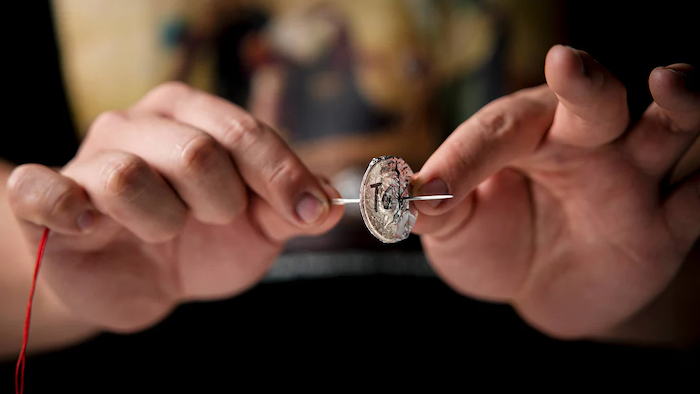 Needle Thru Coin by Artisan Coin 