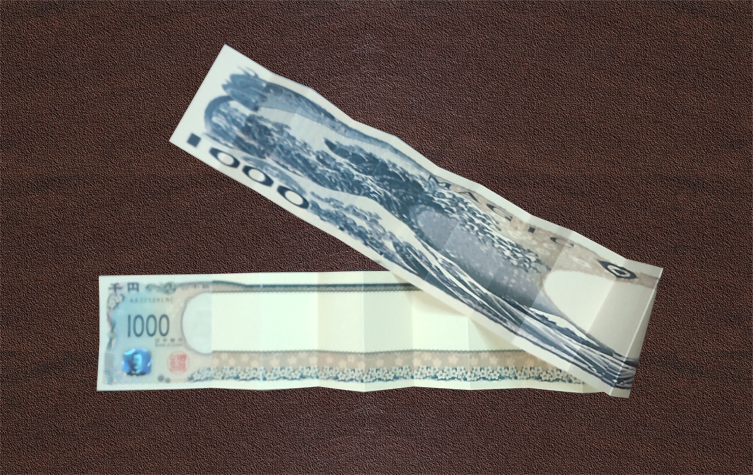 のびすぎる紙幣 by藤原邦恭