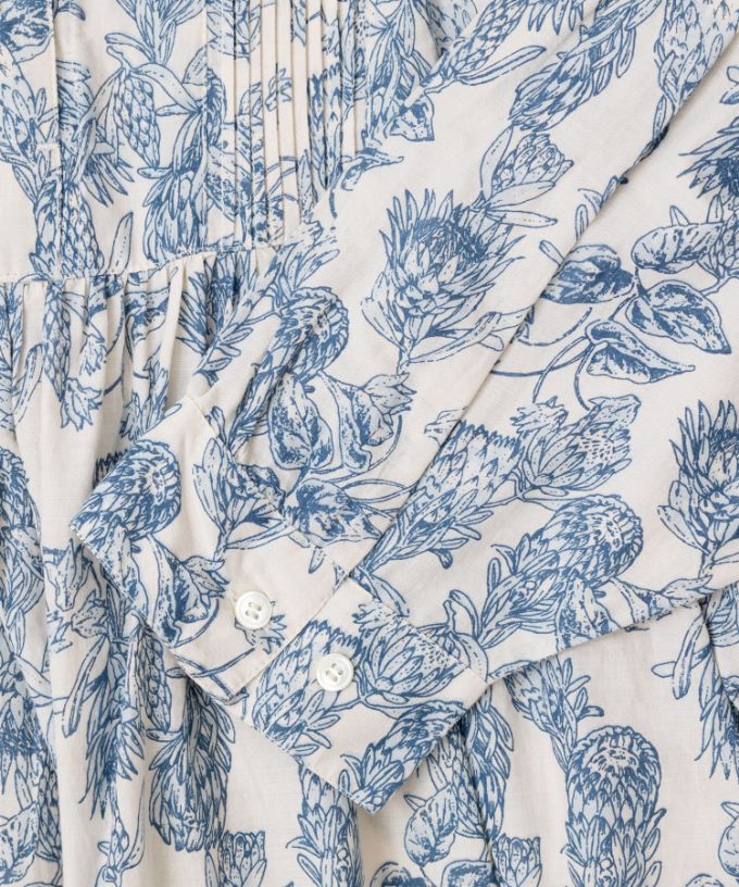 ロリードレス・グレージュ  フラワープリントのドロップショルダーワンピース