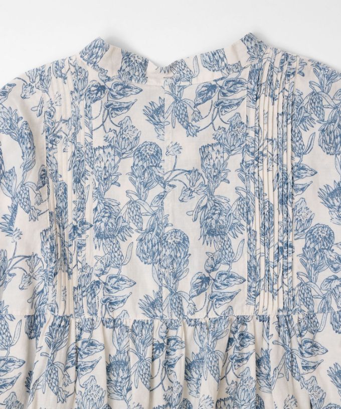 ロリードレス・グレージュ  フラワープリントのドロップショルダーワンピース