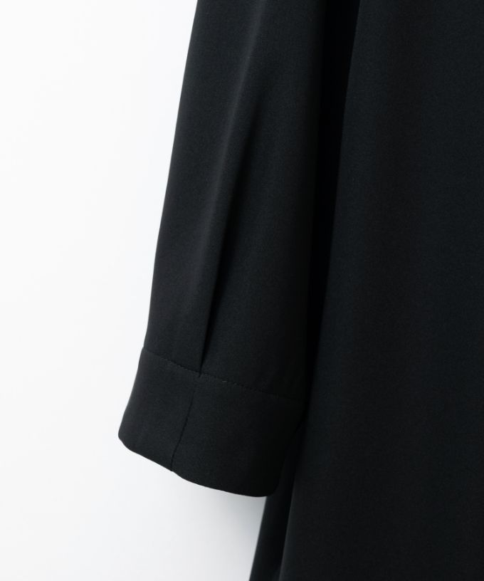 コゼット［Chronicle］コクーンシルエットのシンプルドレス