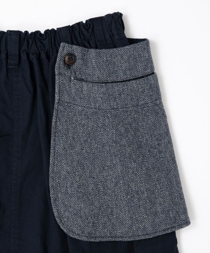 メリザスカート　ビッグポケットつきのタックフレアスカート