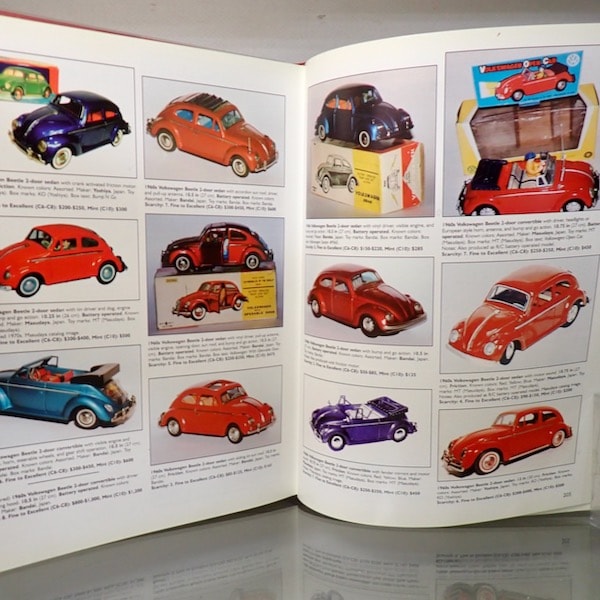 ܡTIN TOY CARS IN THE WORLD ֥ꥭư Ѽ 239ڡ Ѹ