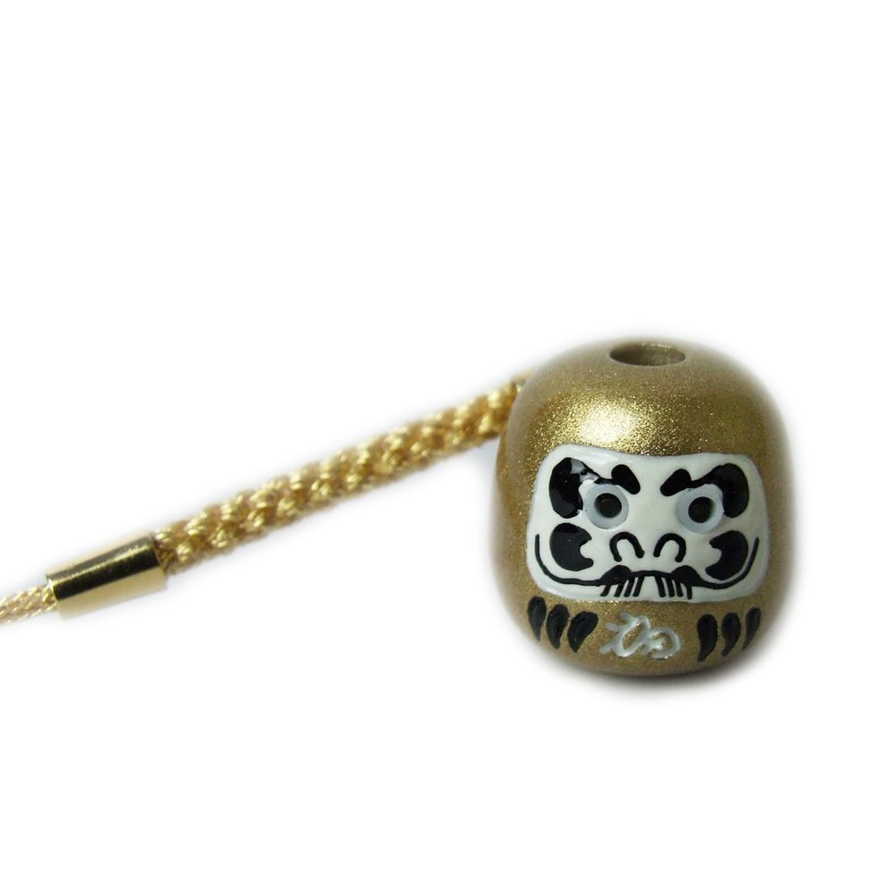 目出しだるまお守り（金） 頭をのぞくと「昇り龍」が見える！　神社で祈願済み