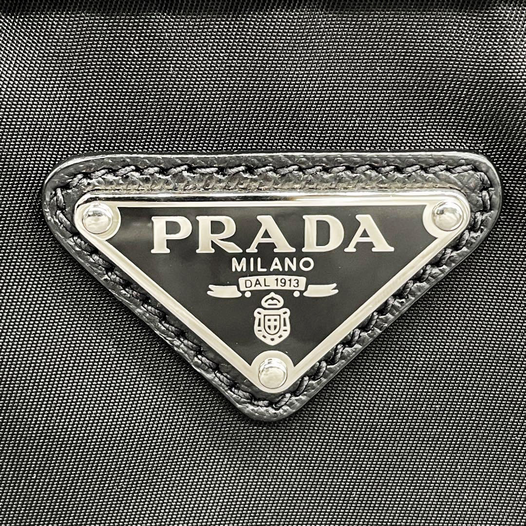 PRADA プラダ リュックサック デイパック ナイロン ファー レザー パンチング 三角ロゴプレート ブラック 1BZ811
